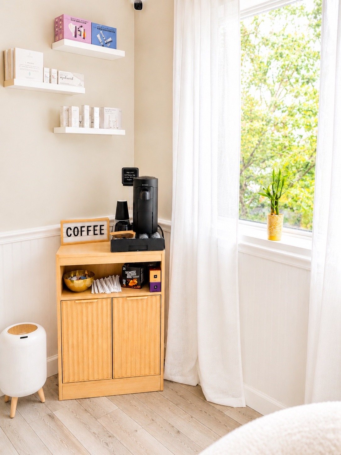 The coffee nook by the window — small luxuries for waiting moments.